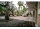 Paver driveway with plenty of parking surrounded by beautiful trees at 5169 Oxford Dr, Sarasota, FL 34242