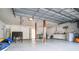 Open garage space with storage cabinets, laundry appliances, and plenty of room for projects at 5169 Oxford Dr, Sarasota, FL 34242