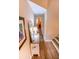 Hallway with decor and hardwood floors at 5169 Oxford Dr, Sarasota, FL 34242