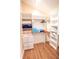 Organized walk-in closet featuring built-in shelving and drawers for optimal storage solutions at 5169 Oxford Dr, Sarasota, FL 34242