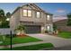 Two-story home with stone accents, covered entryway, and mature landscaping at 7114 Mill Hopper Ct, Palmetto, FL 34221