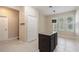 Kitchen area features a large center island for additional storage and prep space at 11933 Pasco Trails Blvd, Spring Hill, FL 34610