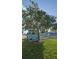 Exterior showcasing shed and fruit tree in landscaped backyard at 3510 Magnolia Way, Punta Gorda, FL 33950