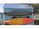 Kayaks are stored on the side of the shed at 3510 Magnolia Way, Punta Gorda, FL 33950