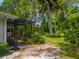 The screened-in patio adds additional outdoor living space at 6049 Patricia Pl, Weeki Wachee, FL 34607
