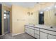 Bathroom featuring a shower and a large double sink vanity at 6049 Patricia Pl, Weeki Wachee, FL 34607
