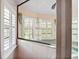 Shower with glass enclosure and shuttered windows in the background at 6049 Patricia Pl, Weeki Wachee, FL 34607