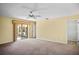 Bedroom with a sliding glass door to an outdoor patio at 6049 Patricia Pl, Weeki Wachee, FL 34607