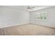 Large bright bedroom featuring a ceiling fan and natural light at 6049 Patricia Pl, Weeki Wachee, FL 34607