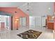 Large living room with tile flooring, high ceilings and fireplace at 6049 Patricia Pl, Weeki Wachee, FL 34607
