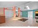 Bright, open living room with a vaulted ceiling and a cozy fireplace at 6049 Patricia Pl, Weeki Wachee, FL 34607