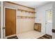 Pantry with plenty of shelves for storage and an exterior door for convenience at 6049 Patricia Pl, Weeki Wachee, FL 34607