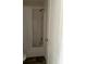 Bathroom with shower/tub combo and wood-look floor at 11876 Keylime Dr, New Port Richey, FL 34654