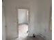 Room with doorway to another room at 5737 Michigan Ave, New Port Richey, FL 34652