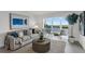 Bright living room with water view and modern furnishings at 8150 Brent St # 734, Port Richey, FL 34668