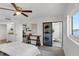 Bedroom with water views, and access to a private balcony at 8150 Brent St # 734, Port Richey, FL 34668