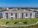 Sand Pebble Pointe building, water access, lush landscaping at 8150 Brent St # 734, Port Richey, FL 34668