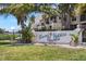 Sand Pebble Pointe community entrance sign with lush landscaping at 8150 Brent St # 734, Port Richey, FL 34668