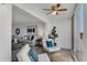 Bright sunroom with seating and views of the living room and water at 8150 Brent St # 734, Port Richey, FL 34668