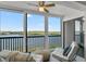 Sunroom with water views and comfortable seating for relaxation at 8150 Brent St # 734, Port Richey, FL 34668