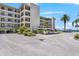 Sand Pebble Pointe building with parking and water views at 8150 Brent St # 734, Port Richey, FL 34668
