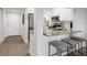 Modern kitchen with breakfast bar and granite countertops at 8150 Brent St # 734, Port Richey, FL 34668
