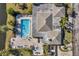 Community pool and hot tub with surrounding patio at 2333 Feather Sound Dr # A203, Clearwater, FL 33762