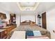 Main bedroom with large bed and tiger plush toy at 1026 Roosevelt Ave, Spring Hill, FL 34604