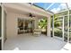 Covered patio with access to the interior of the home at 1383 Dartford Dr, Tarpon Springs, FL 34688