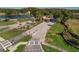 Community entrance with fountain and landscaping at 1383 Dartford Dr, Tarpon Springs, FL 34688