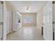 Bright Gathering room featuring built-in shelving and tile flooring at 1383 Dartford Dr, Tarpon Springs, FL 34688