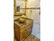Bathroom vanity featuring custom wood cabinets, mosaic tile, and a vessel sink at 1873 Mazo Mnr # T5, Lutz, FL 33558