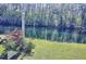 Beautiful pond view with lush foliage and mature trees at 1873 Mazo Mnr # T5, Lutz, FL 33558