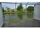 Enjoy the view from the screened porch overlooking the calm lake at 1873 Mazo Mnr # T5, Lutz, FL 33558