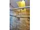Bathroom featuring a tile shower with a skylight at 1873 Mazo Mnr # T5, Lutz, FL 33558