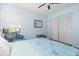 Relaxing bedroom with a queen-size bed and sitting area at 4486 Berisford Blvd, Palm Harbor, FL 34685