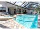 Large pool with spa and screened enclosure at 4486 Berisford Blvd, Palm Harbor, FL 34685