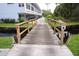 Charming footbridge over a canal, providing access to the community at 1873 Mazo Mnr # T5, Lutz, FL 33558