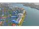 Breathtaking aerial view of waterfront condos, featuring city skyline and multiple boat docks at 770 Island Way # N302, Clearwater, FL 33767