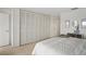 Spacious bedroom with large closet and a serene, comfortable atmosphere at 770 Island Way # N302, Clearwater, FL 33767