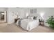 Comfortable bedroom with serene decor, ample natural light, and stylish furnishings at 770 Island Way # N302, Clearwater, FL 33767