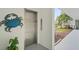 Modern elevator with tropical decor, adding a unique touch to the building at 770 Island Way # N302, Clearwater, FL 33767