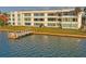 Condominium exterior boasts waterfront views and private pier access at 770 Island Way # N302, Clearwater, FL 33767