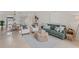 Inviting open-concept living space with stylish furnishings and adjacent dining area at 770 Island Way # N302, Clearwater, FL 33767