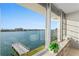 Stunning water view from a living space with a pier at 770 Island Way # N302, Clearwater, FL 33767