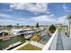 An aerial view of a waterfront neighborhood with a pool at 13753 Judy Ave, Hudson, FL 34667