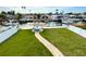 Private backyard oasis with patio and canal views at 13753 Judy Ave, Hudson, FL 34667