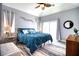 Spacious bedroom with plush bedding and access to a private balcony at 13753 Judy Ave, Hudson, FL 34667
