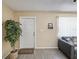 Bright entryway with a view into living room at 11935 Bayonet Ln # 0, New Port Richey, FL 34654