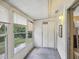 Bright Florida room with windows and access to the backyard at 11935 Bayonet Ln # 0, New Port Richey, FL 34654